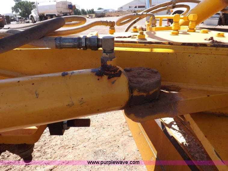image for item H1801 2003 Volvo G720B articulated motor grader