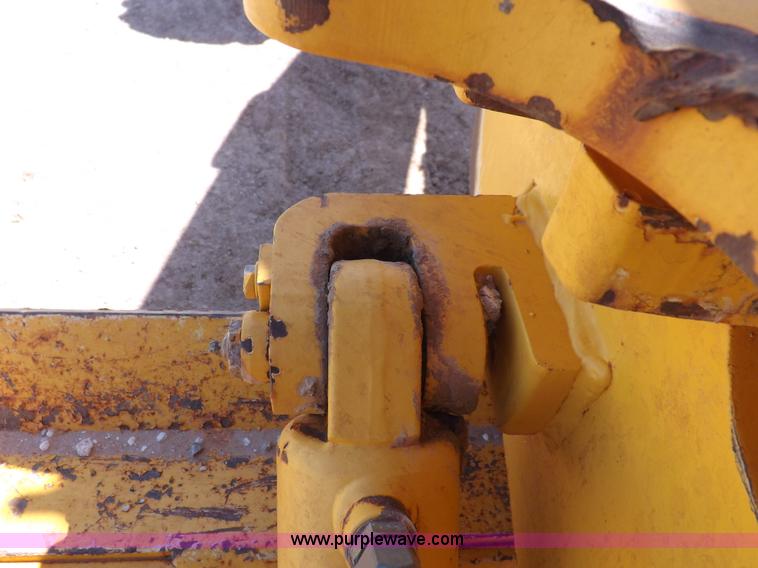 image for item H1801 2003 Volvo G720B articulated motor grader
