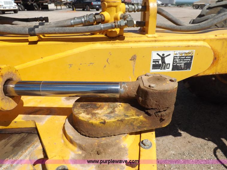 image for item H1801 2003 Volvo G720B articulated motor grader