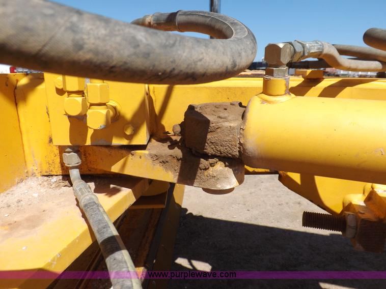 image for item H1801 2003 Volvo G720B articulated motor grader