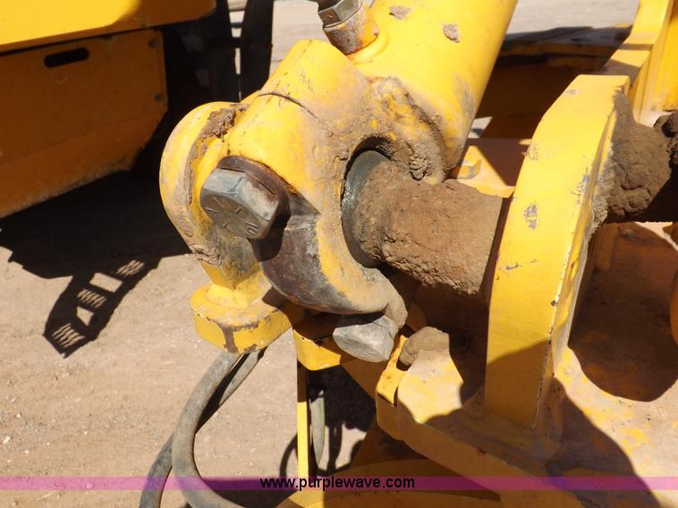 image for item H1801 2003 Volvo G720B articulated motor grader