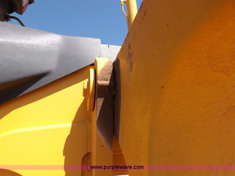 image for item H1801 2003 Volvo G720B articulated motor grader