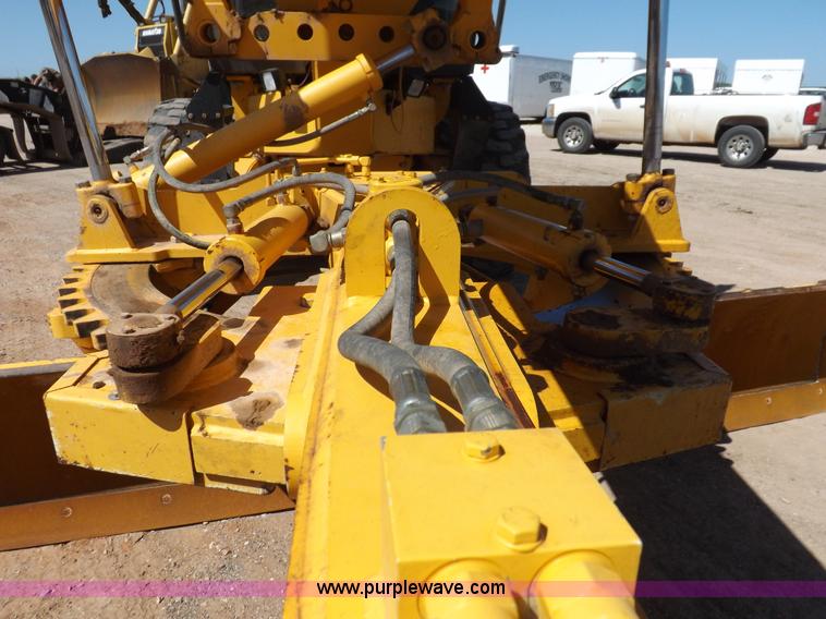 image for item H1801 2003 Volvo G720B articulated motor grader