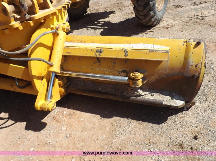 image for item H1801 2003 Volvo G720B articulated motor grader