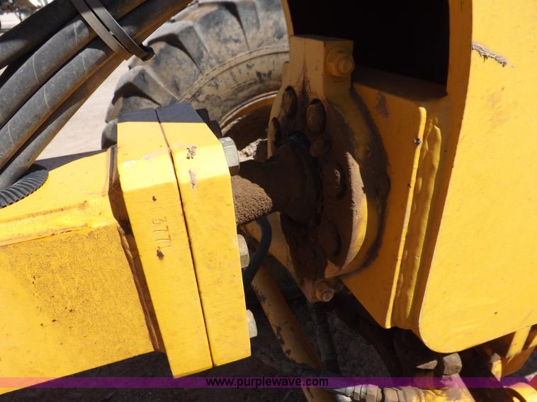 image for item H1801 2003 Volvo G720B articulated motor grader