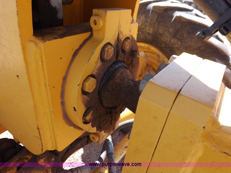 image for item H1801 2003 Volvo G720B articulated motor grader