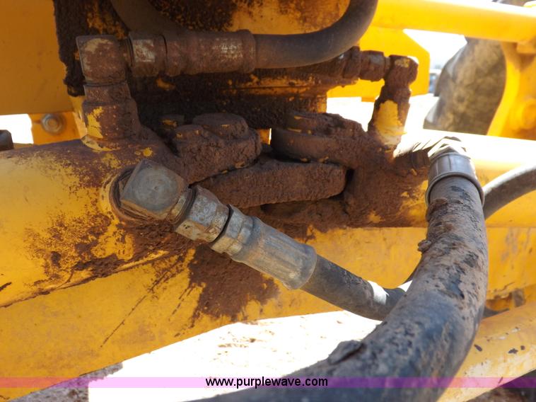 image for item H1801 2003 Volvo G720B articulated motor grader