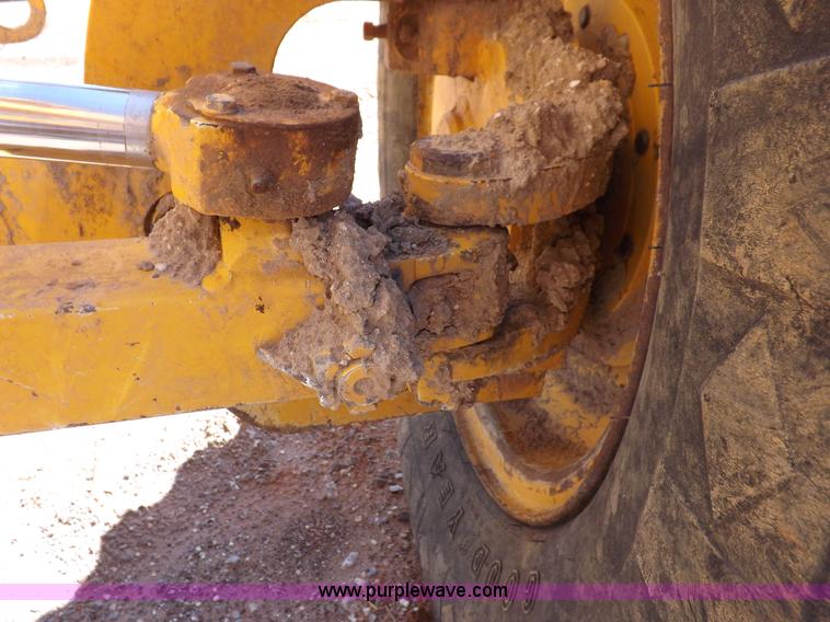 image for item H1801 2003 Volvo G720B articulated motor grader