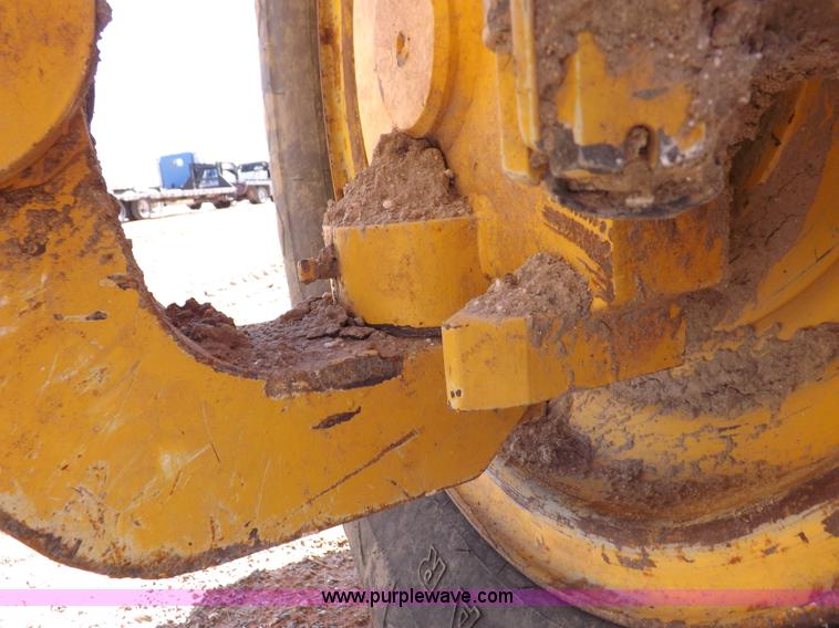 image for item H1801 2003 Volvo G720B articulated motor grader