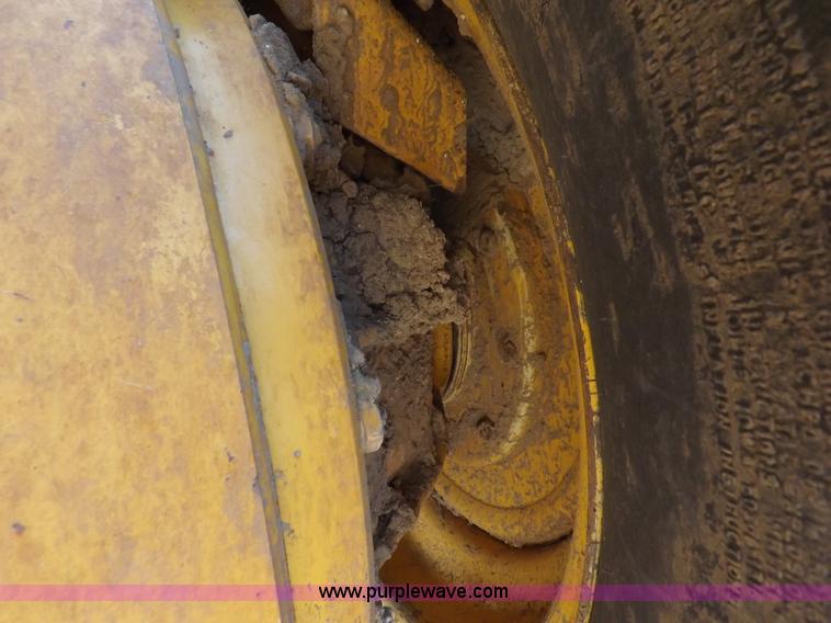 image for item H1801 2003 Volvo G720B articulated motor grader