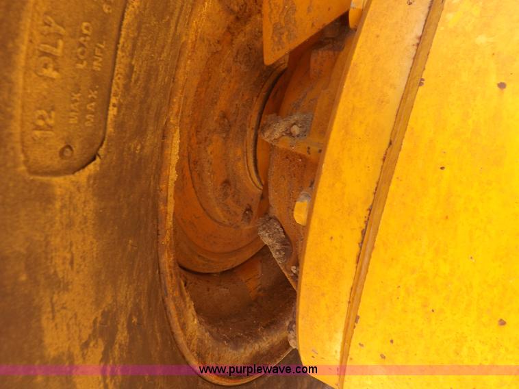 image for item H1801 2003 Volvo G720B articulated motor grader