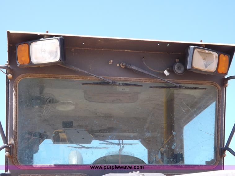 image for item H1801 2003 Volvo G720B articulated motor grader