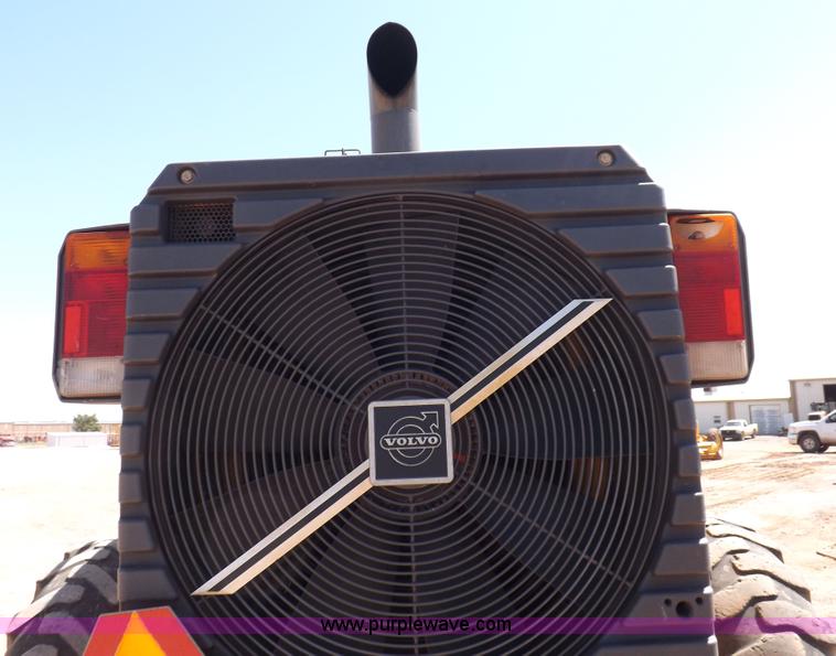 image for item H1801 2003 Volvo G720B articulated motor grader