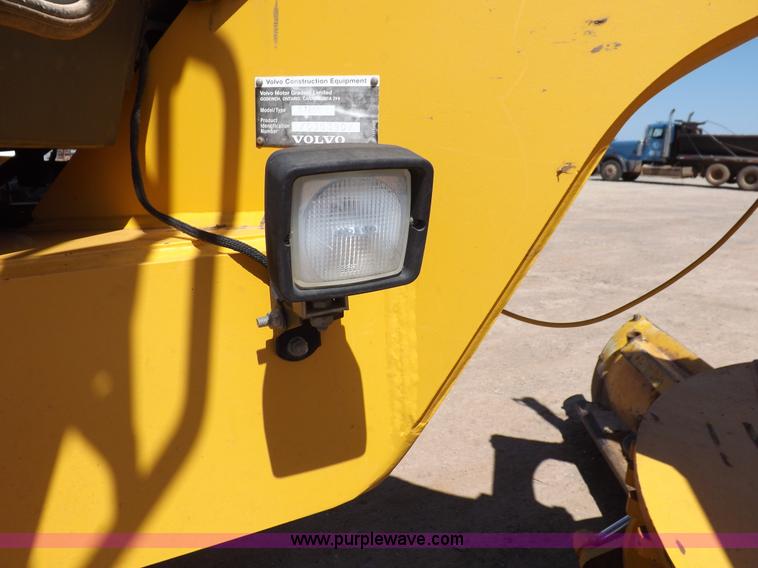 image for item H1801 2003 Volvo G720B articulated motor grader