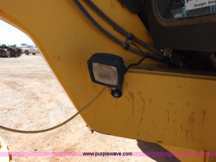 image for item H1801 2003 Volvo G720B articulated motor grader