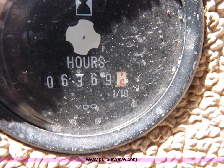 image for item H1801 2003 Volvo G720B articulated motor grader