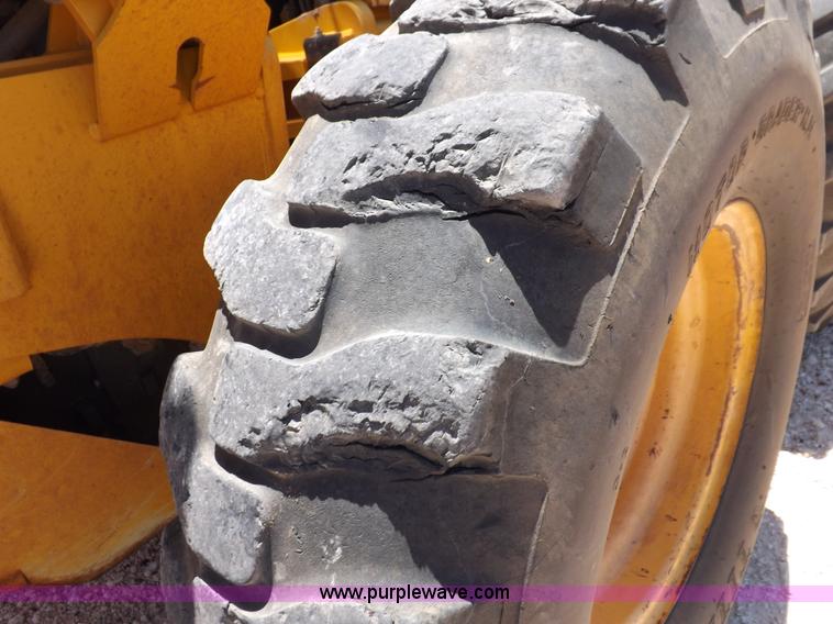 image for item H1801 2003 Volvo G720B articulated motor grader