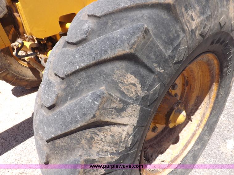 image for item H1801 2003 Volvo G720B articulated motor grader