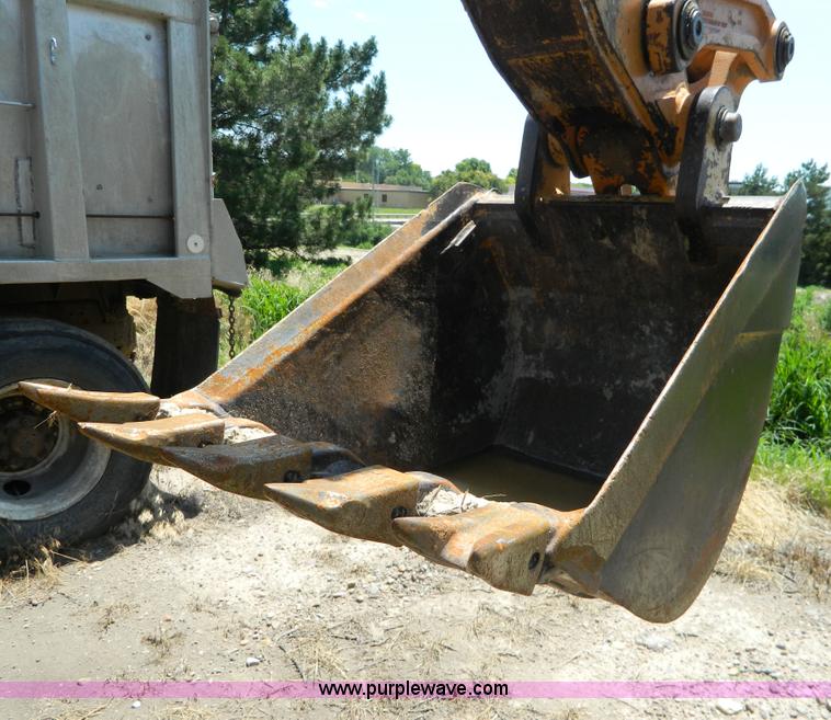 image for item H2457 2000 Case 580 Super L backhoe
