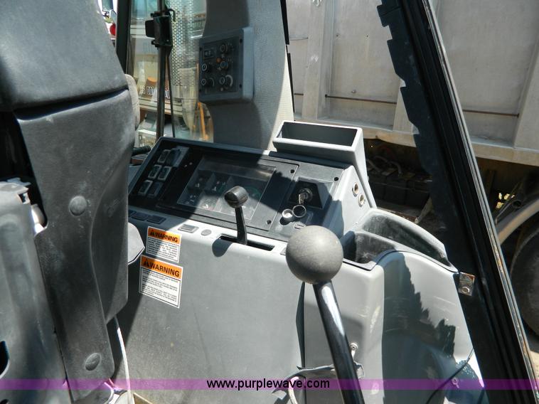 image for item H2457 2000 Case 580 Super L backhoe