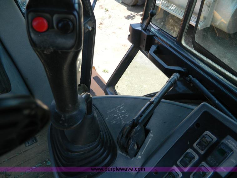 image for item H2457 2000 Case 580 Super L backhoe