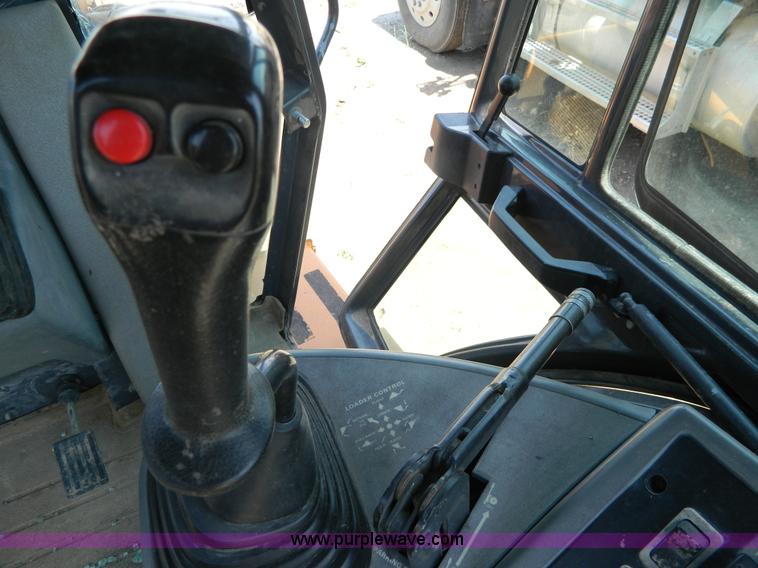 image for item H2457 2000 Case 580 Super L backhoe