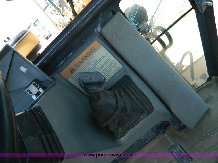 image for item H2457 2000 Case 580 Super L backhoe