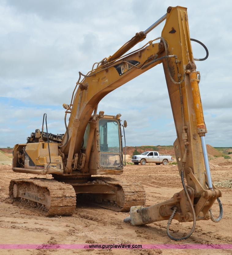 image for item H2980 2000 Caterpillar 318BL excavator