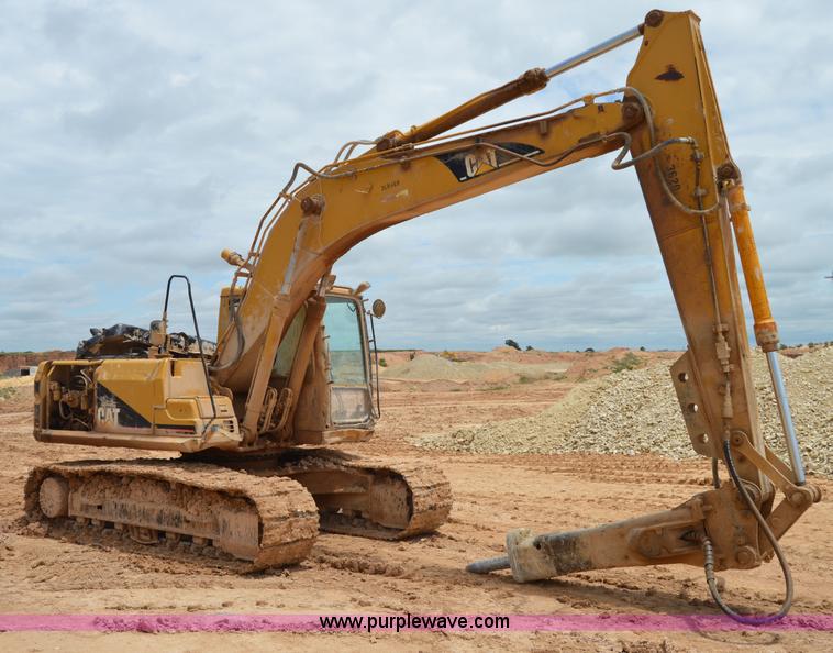image for item H2980 2000 Caterpillar 318BL excavator
