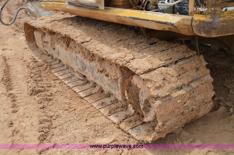 image for item H2980 2000 Caterpillar 318BL excavator