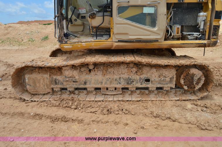 image for item H2980 2000 Caterpillar 318BL excavator