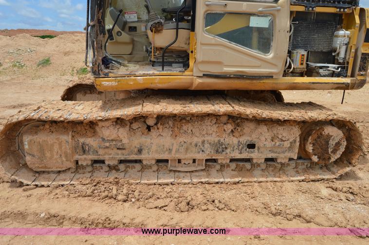 image for item H2980 2000 Caterpillar 318BL excavator