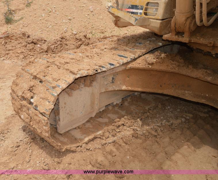 image for item H2980 2000 Caterpillar 318BL excavator