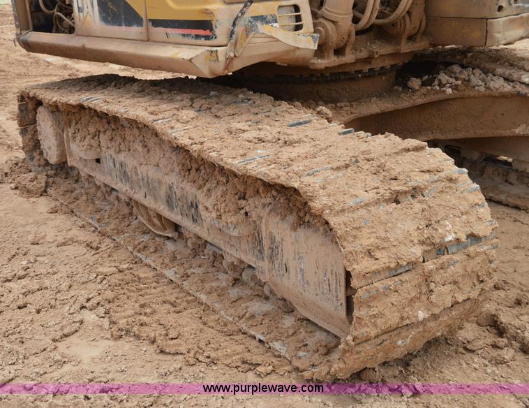 image for item H2980 2000 Caterpillar 318BL excavator