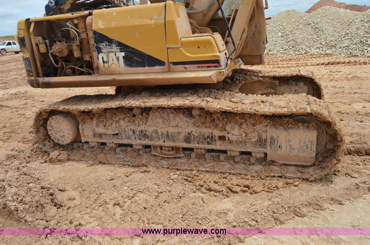 image for item H2980 2000 Caterpillar 318BL excavator