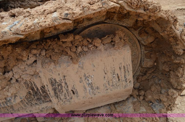 image for item H2980 2000 Caterpillar 318BL excavator