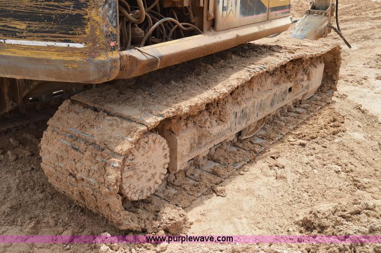 image for item H2980 2000 Caterpillar 318BL excavator