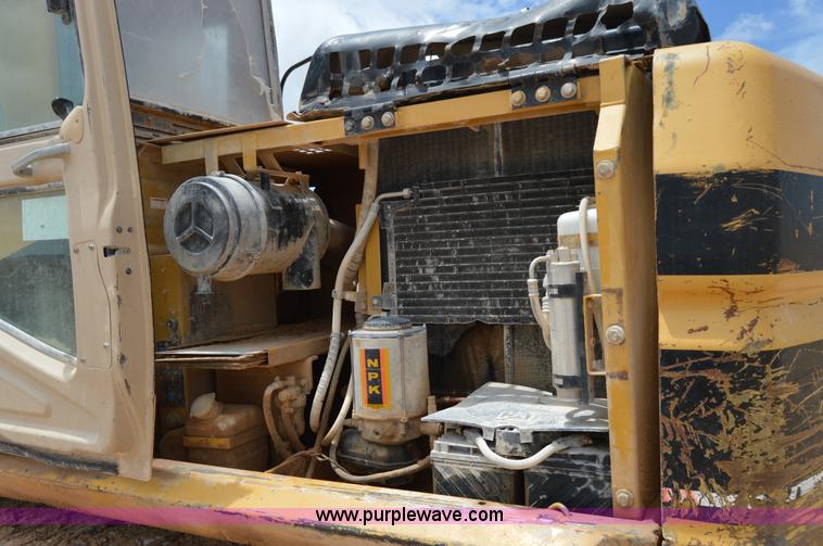 image for item H2980 2000 Caterpillar 318BL excavator