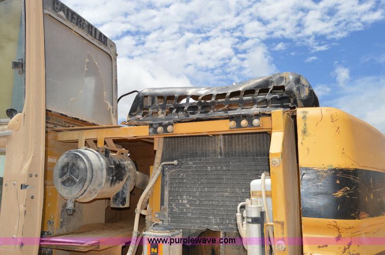 image for item H2980 2000 Caterpillar 318BL excavator