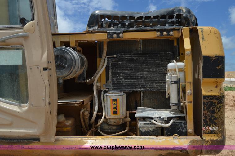 image for item H2980 2000 Caterpillar 318BL excavator