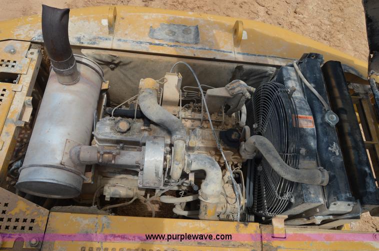 image for item H2980 2000 Caterpillar 318BL excavator