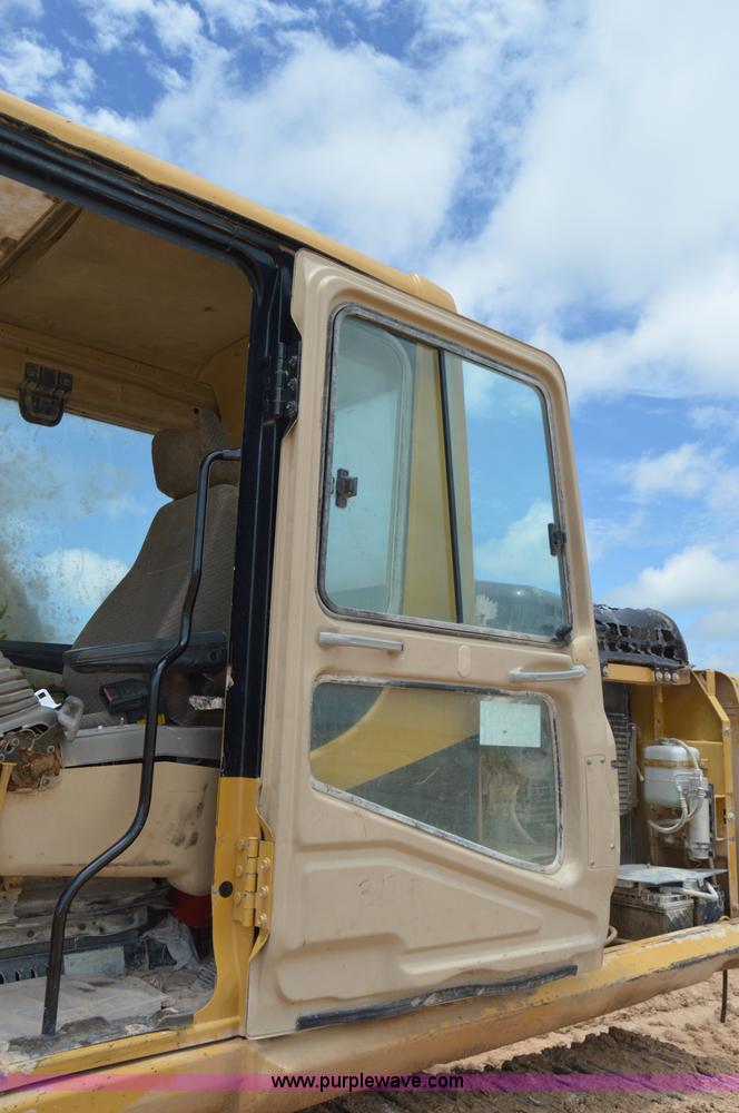 image for item H2980 2000 Caterpillar 318BL excavator