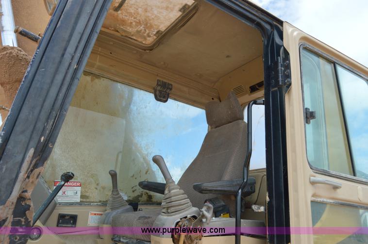 image for item H2980 2000 Caterpillar 318BL excavator