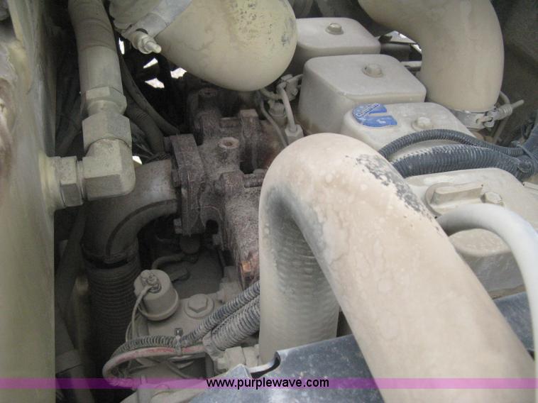 image for item H5362 2002 Ingersoll Rand DD70 articulated smooth drum vibratory roller