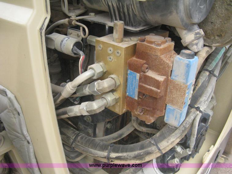 image for item H5362 2002 Ingersoll Rand DD70 articulated smooth drum vibratory roller