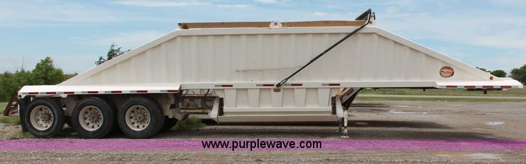 image for item H5641 2007 Construction Trailer Specialist, Inc. BDT-42 triple axle belly dump trailer