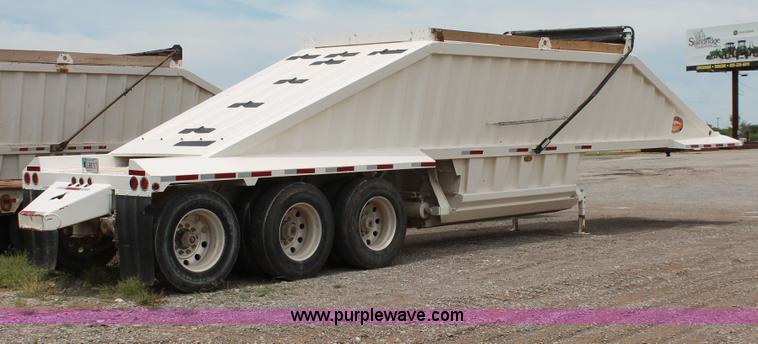 image for item H5641 2007 Construction Trailer Specialist, Inc. BDT-42 triple axle belly dump trailer