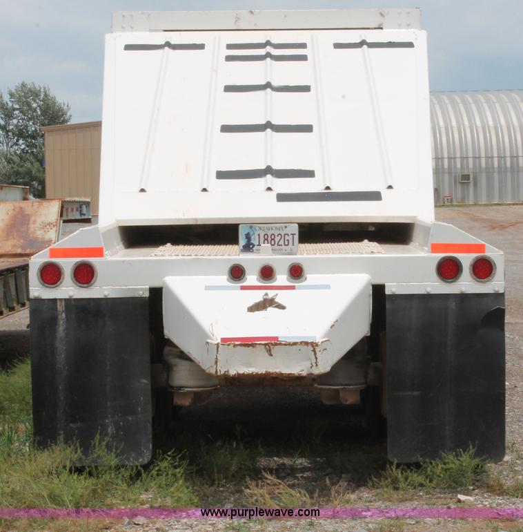 image for item H5641 2007 Construction Trailer Specialist, Inc. BDT-42 triple axle belly dump trailer