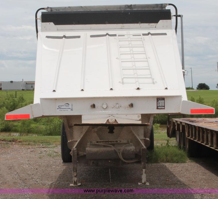 image for item H5641 2007 Construction Trailer Specialist, Inc. BDT-42 triple axle belly dump trailer