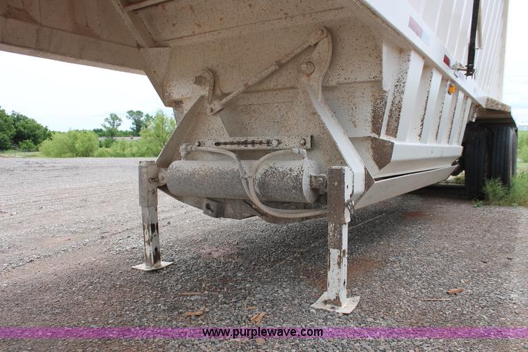 image for item H5641 2007 Construction Trailer Specialist, Inc. BDT-42 triple axle belly dump trailer